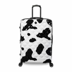 IT Luggage Indulging - 4pc Set (Moo Cow Print) -UK Suitcase Sales Shop 33198 UK16 3039A08Moocowblack whiterepeatprintSSFrontpaneldirectly25in